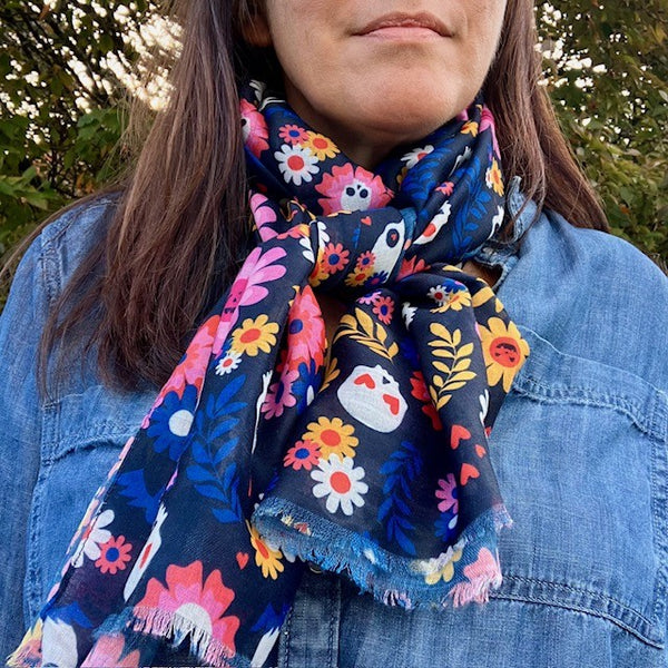 The Coco Scarf is a long rectangular scarf that is lightweight