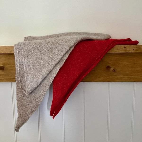 The Cosette Scarf is available in two colours, Ecru or Red