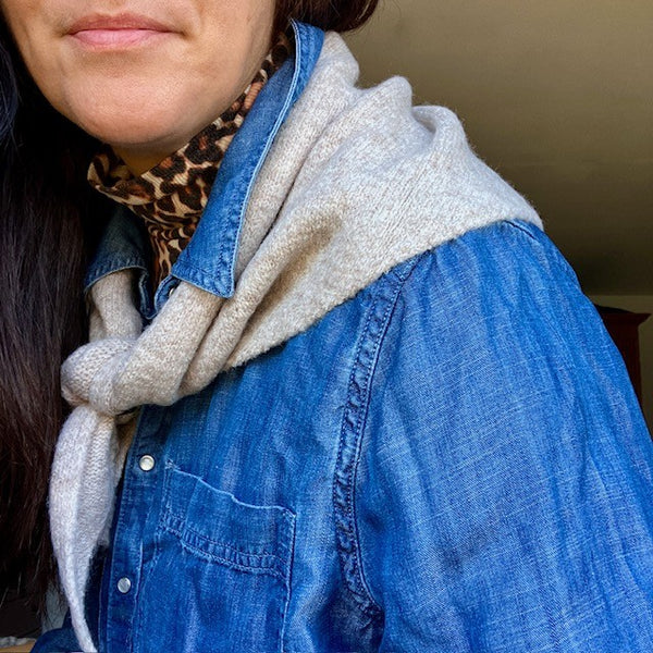 The Cosette Scarf is this seasons must have triangular scarf that sits on your shoulders