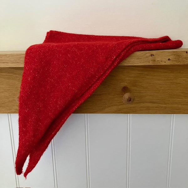 The Cosette Scarf is a small triangular scarf, the must have on-trend scarf of the season