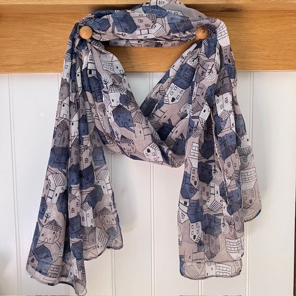 The Cosy Town scarf reminds us of story book houses and the repeating pattern makes this a fun and eye catching cosy scarf to wear