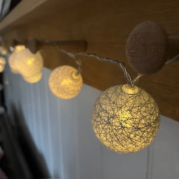 Cotton Ball String LED Light garland is the ideal way to add warm cosy ambient lighting to your home