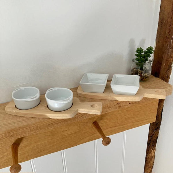 Useful little dipping bowls on a bamboo serving board, perfect for cosy nights in