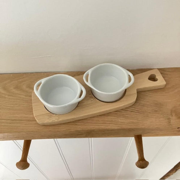 Useful little dipping bowls on a bamboo serving board, perfect for cosy nights in