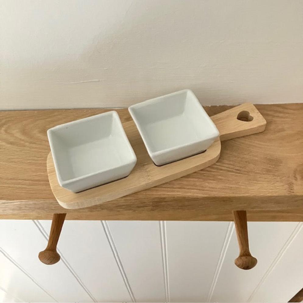 Useful little dipping bowls on a bamboo serving board, perfect for cosy nights in