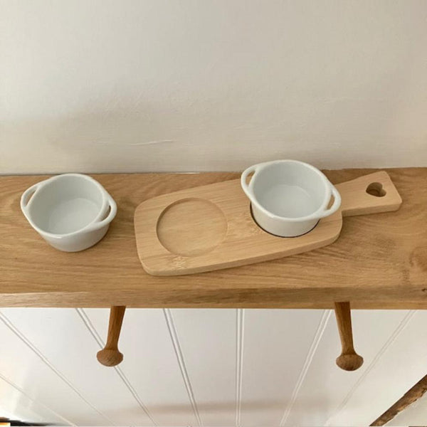 Useful little dipping bowls on a bamboo serving board, perfect for cosy nights in