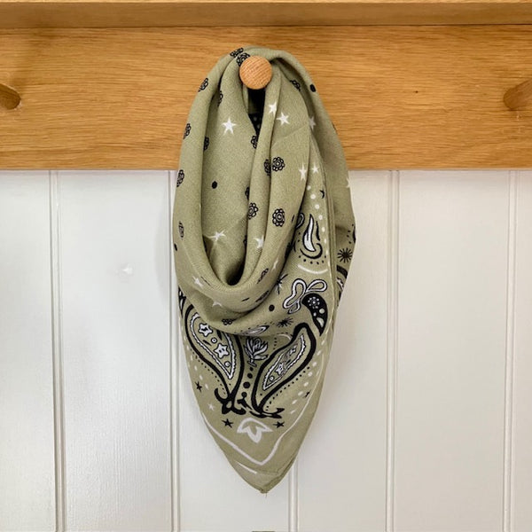 The Dolly Scarf Sage features a fabulous western style pattern of stars, dots, paisley and small flowers giving it that lovely cowgirl look that's so on trend at the moment