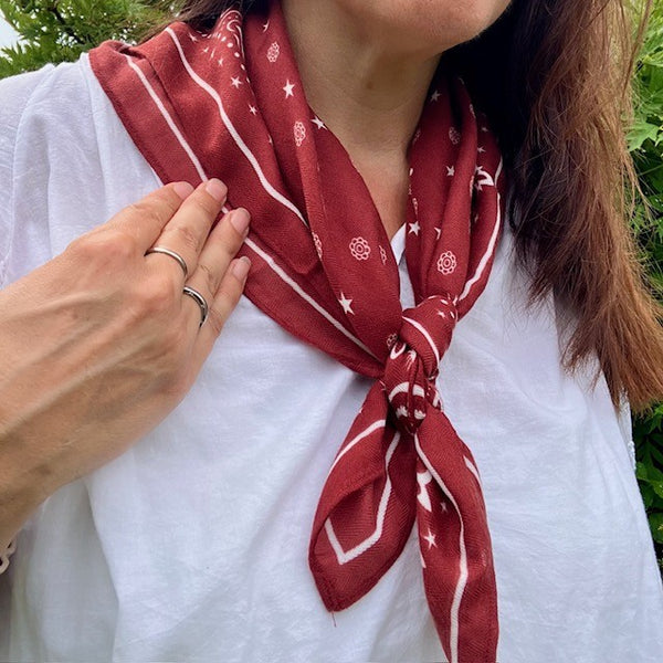 The Dolly Scarf is made from polyester and is light weight