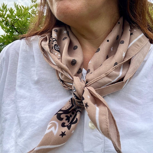 The Dolly Scarf is 100% polyester and light weight