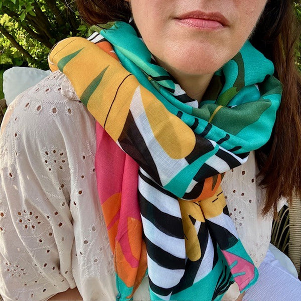 The Elio Scarf Green is the perfect bright and bold accessory to bring colour and pattern to any outfit