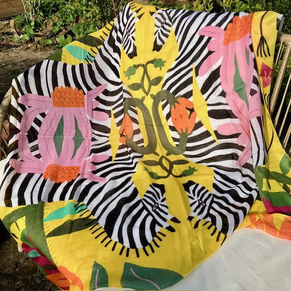 The Elio Scarf Yellow is a fabulous square scarf that can be word so many ways