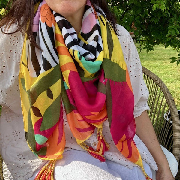 The Elio Scarf Yellow is the perfect cosy accessory for summer