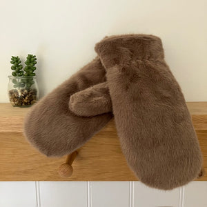 The Elsa Mittens Caramel are the ultimate luxurious cosy gift for someone who likes their hands super warm and toasty