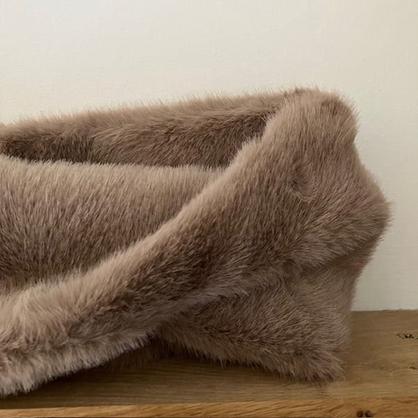 The Estelle Faux Fur Snood Beige is the perfect is an on-trend style with luxurious cosy warmth