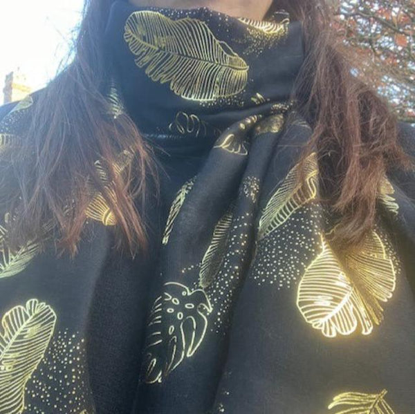 The Farah Scarf is a stunning bold patterned and shimmering eye catching accessory