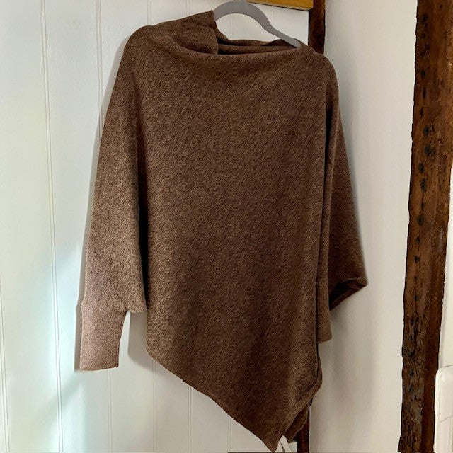 The Floella Poncho Brown is a fabulous design and perfect cosy accessory; a jumper, a poncho & a scarf in one!