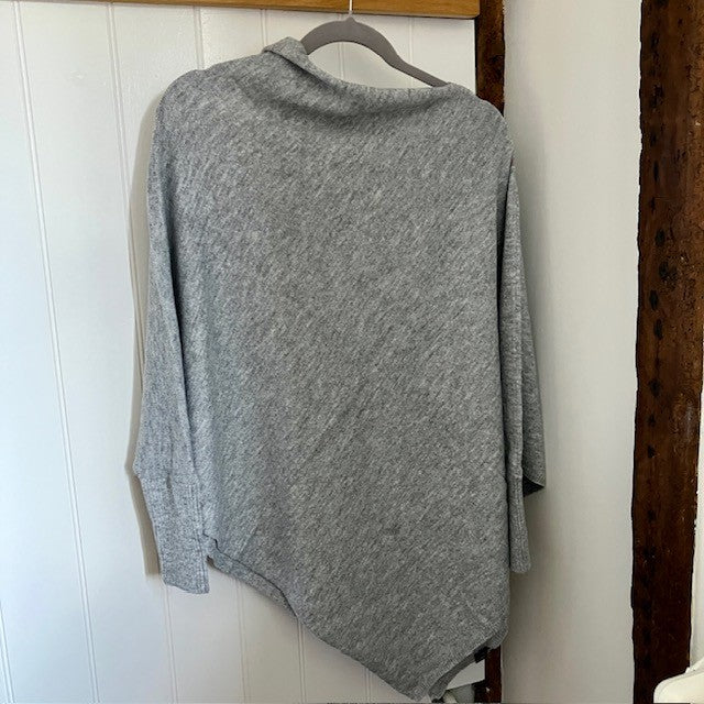 The Floella Poncho Light Grey is a fabulous design and perfect cosy accessory; a jumper, a poncho & a scarf in one!