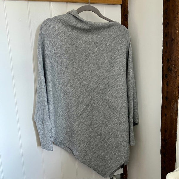 The Floella Poncho Light Grey is a fabulous design and perfect cosy accessory; a jumper, a poncho & a scarf in one!