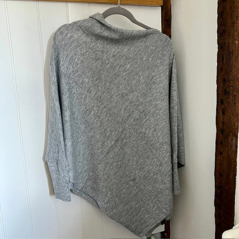 The Floella Poncho Light Grey is a fabulous design and perfect cosy accessory; a jumper, a poncho & a scarf in one!