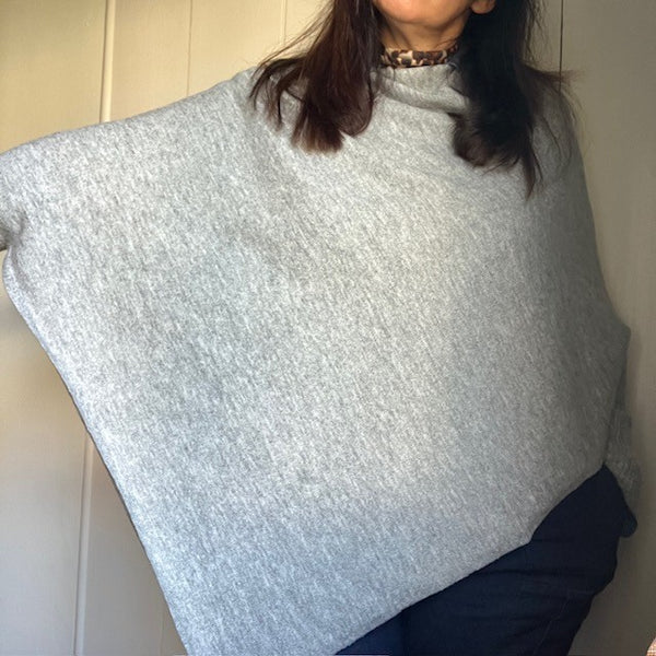 The Floella Poncho has a diagonal hem that is both flattering and covering