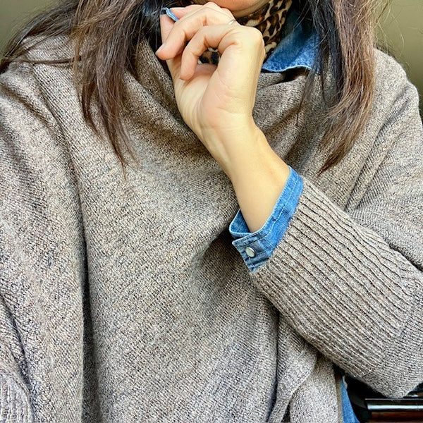 The Floella Poncho is the perfect multitasking cosy accessory