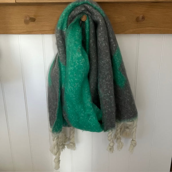 The Frida Scarf Grey & Seafoam Green is a wonderfully soft, on-trend large statement scarf that will add warmth and character to any outfit