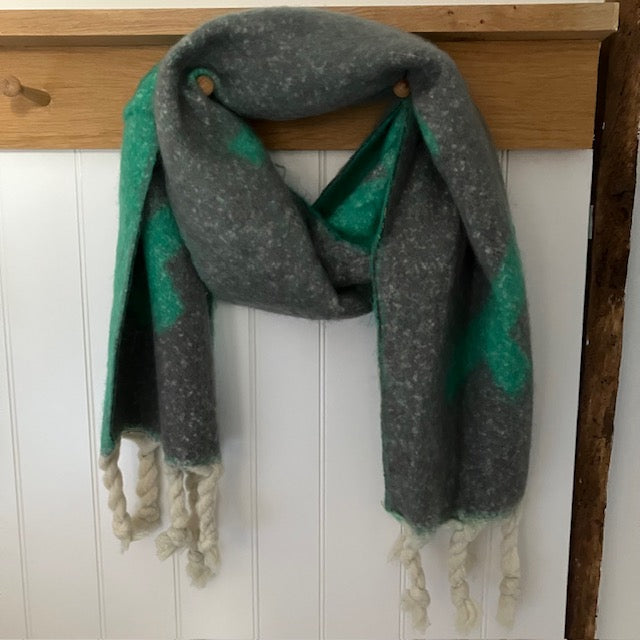 The Frida Scarf Grey & Seafoam Green is a wonderfully soft, on-trend large statement scarf that will add warmth and character to any outfit