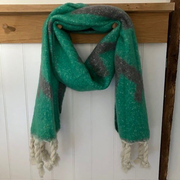 The Frida Scarf Grey & Seafoam Green is a wonderfully soft, on-trend large statement scarf that will add warmth and character to any outfit