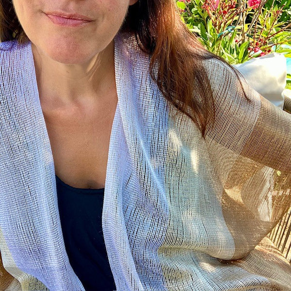 The Goldie Kimono has a shimmering golden thread to it