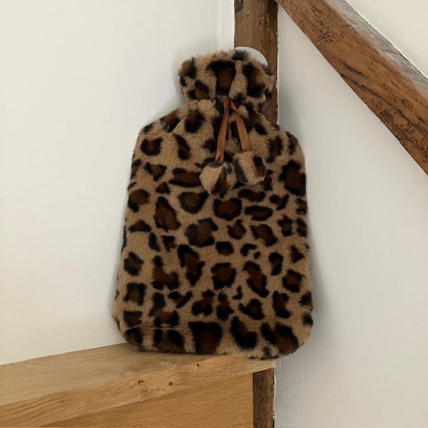 The Cosy Leopard Print Hot Water Bottle Rich Brown will have your warm and cosy in no time