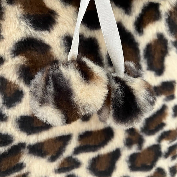 The Cosy Leopard Print Hot Water Bottle Cream will have your warm and cosy in no time