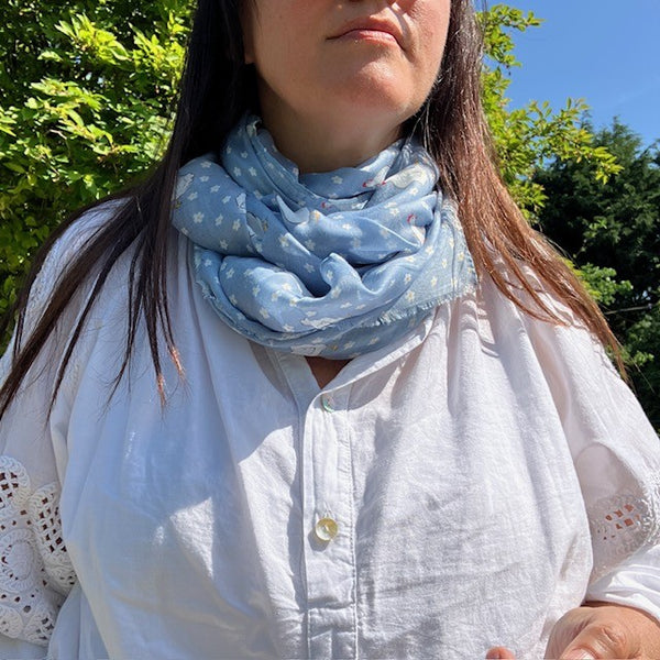 The Henrietta Scarf Blue can be worn long, tied as a snood or loose around the shoulders