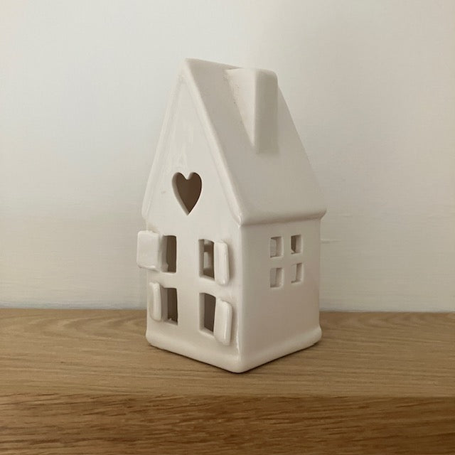 The Home Sweet Home Lantern - White is an adorable little ceramic house that provides a wonderful cosy glow