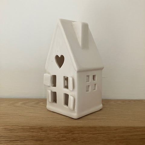 The Home Sweet Home Lantern - White is an adorable little ceramic house that provides a wonderful cosy glow