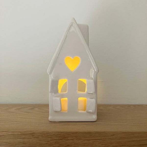 The Home Sweet Home Lantern - White is an adorable little ceramic house that provides a wonderful cosy glow