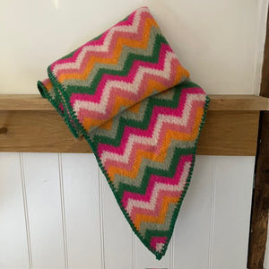 The Isla Scarf Pink, Green & Orange is has a gorgeous chevron pattern and delicious colours