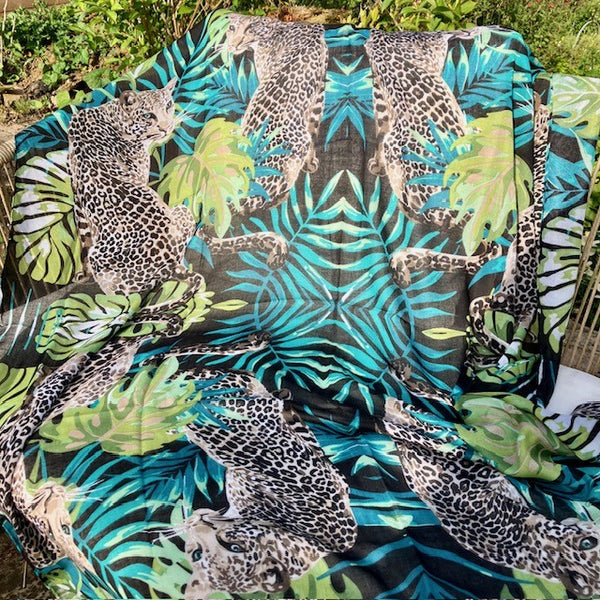 The Isra Scarf is a gorgeous square scarf with a jungle pattern