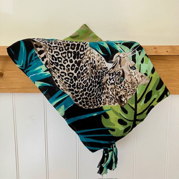 The Isra Scarf  is square and has gorgeous tassels on the end of each corner