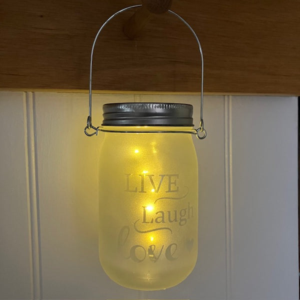 Glass Mason jar with metal lid and metal handle - Live Laugh Love