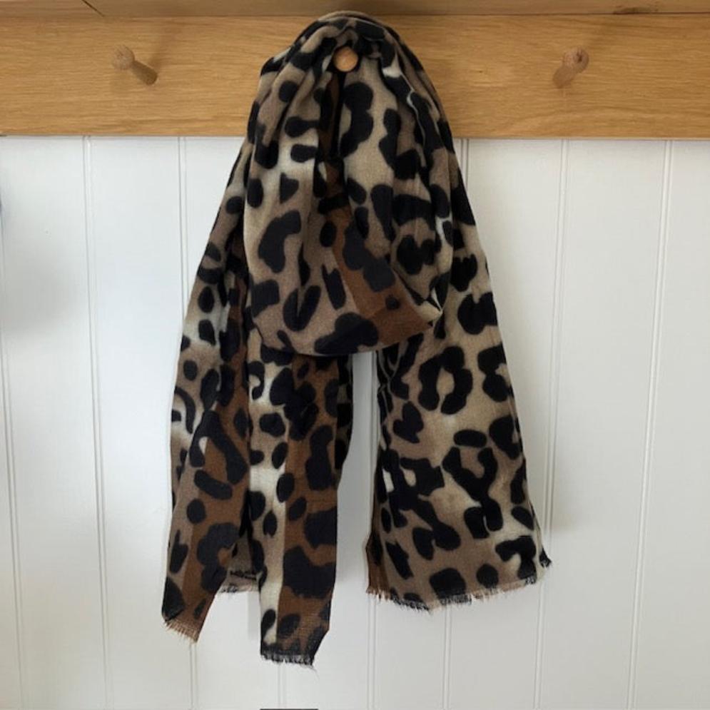 The Katie Scarf Brown in on trend leopard print combined with cosy and super soft material