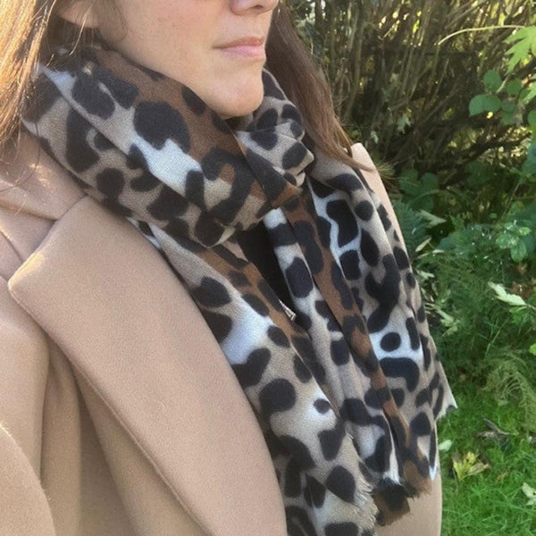 The Katie Scarf Brown in on trend leopard print combined with cosy and super soft material