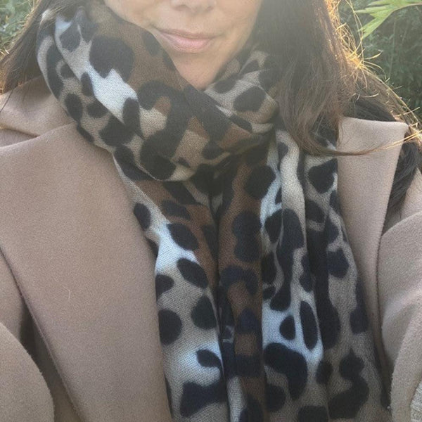 The Katie Scarf Brown in on trend leopard print combined with cosy and super soft material