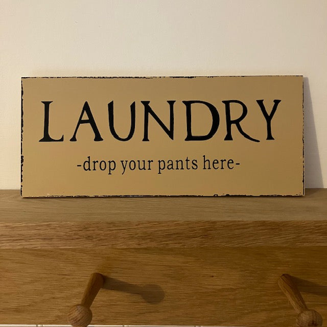 The Laundry Sign 'Drop Your Pants Here' is the perfect cheeky addition to add to your nest