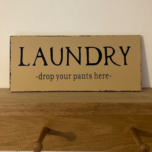 The Laundry Sign 'Drop Your Pants Here' is the perfect cheeky addition to add to your nest