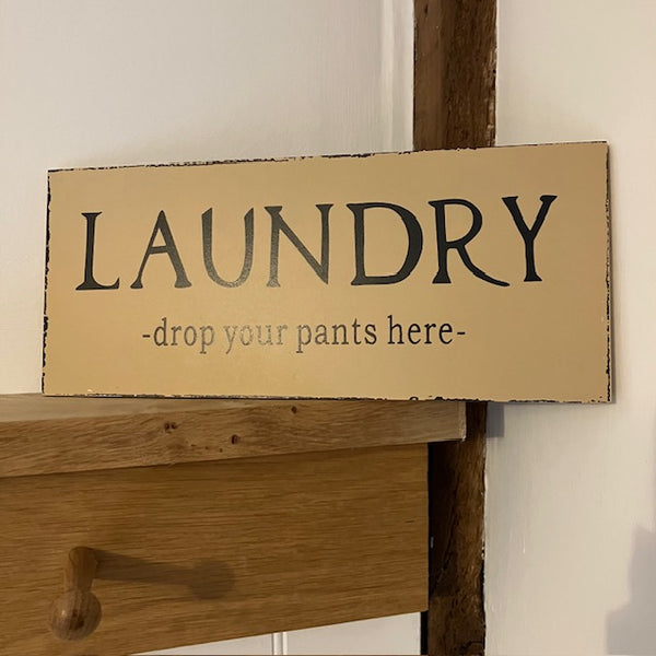 The Laundry Sign 'Drop Your Pants Here' is the perfect cheeky addition to add to your nest