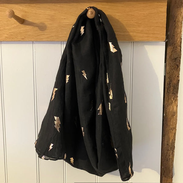 The Levina Scarf is a fabulous statement scarf that will add a touch of gold glamour to your outfit