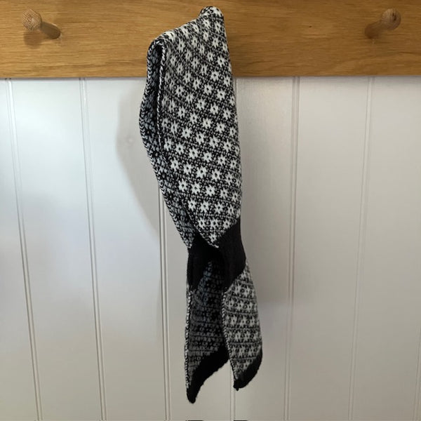 The Linnea Scarf is a unique pull through  style that gives a shorter scarf effect