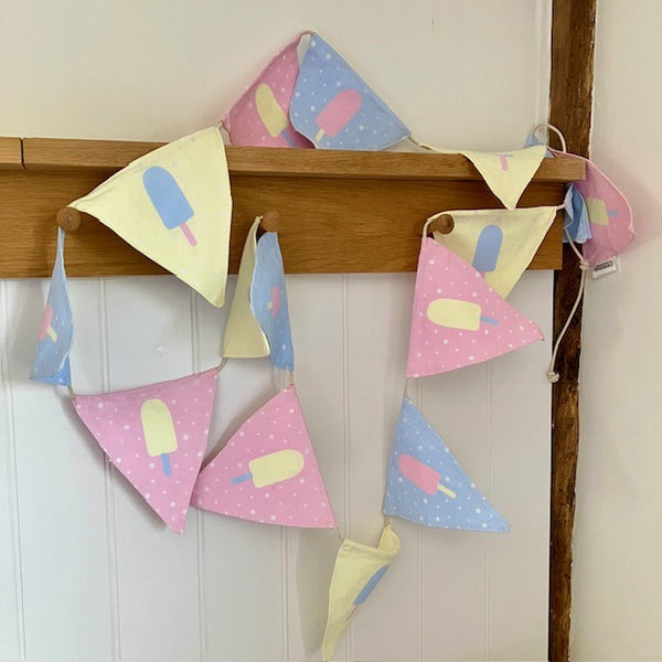 Cotton bunting with rope to hang up with, super pretty pastel lolly design ideal for summer parties