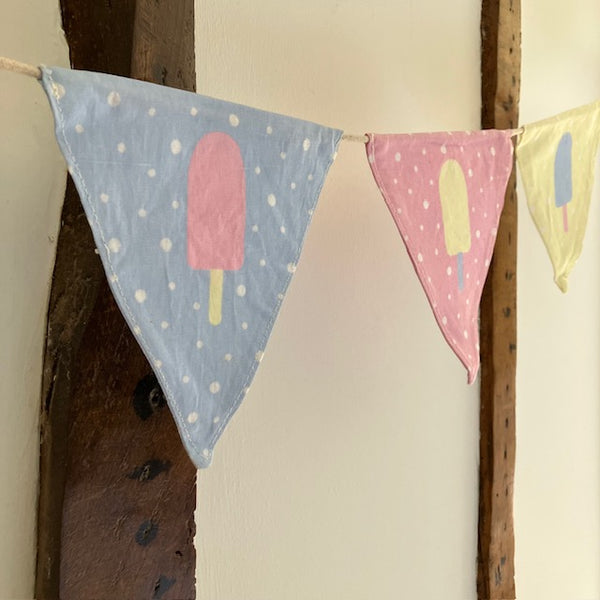 Fabric bunting in gorgeous pastel colours; blue, pink and yellow