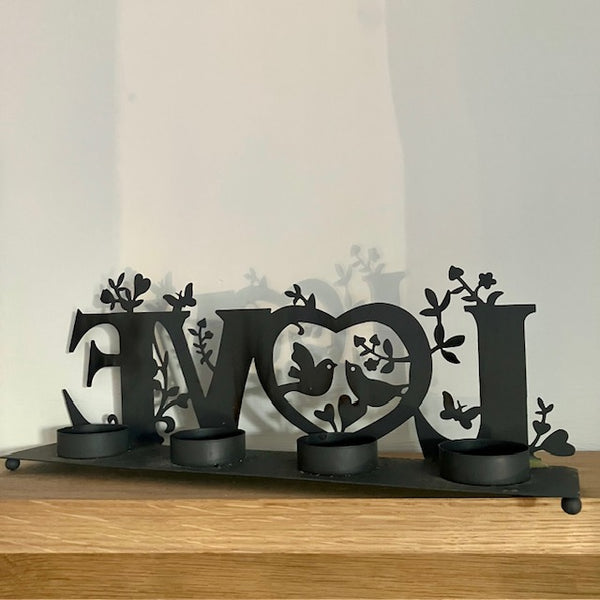 The 'Love' Metal Tea Light Holder is the perfect cosy home decor to add gorgeous ambient lighting to your home or dining table